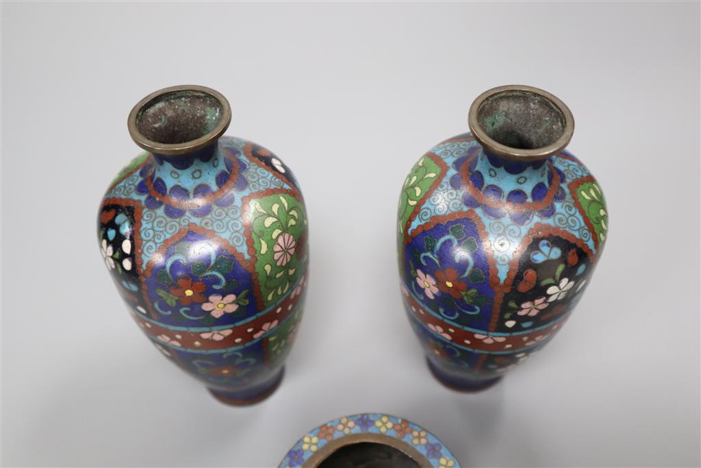 A pair of Chinese cloisonne vases and a similar small bowl